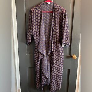 Medium Shirley from LuLaRoe.  Blue, tan and red.